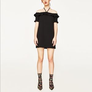 • Frilled Dress with Bow Detail •